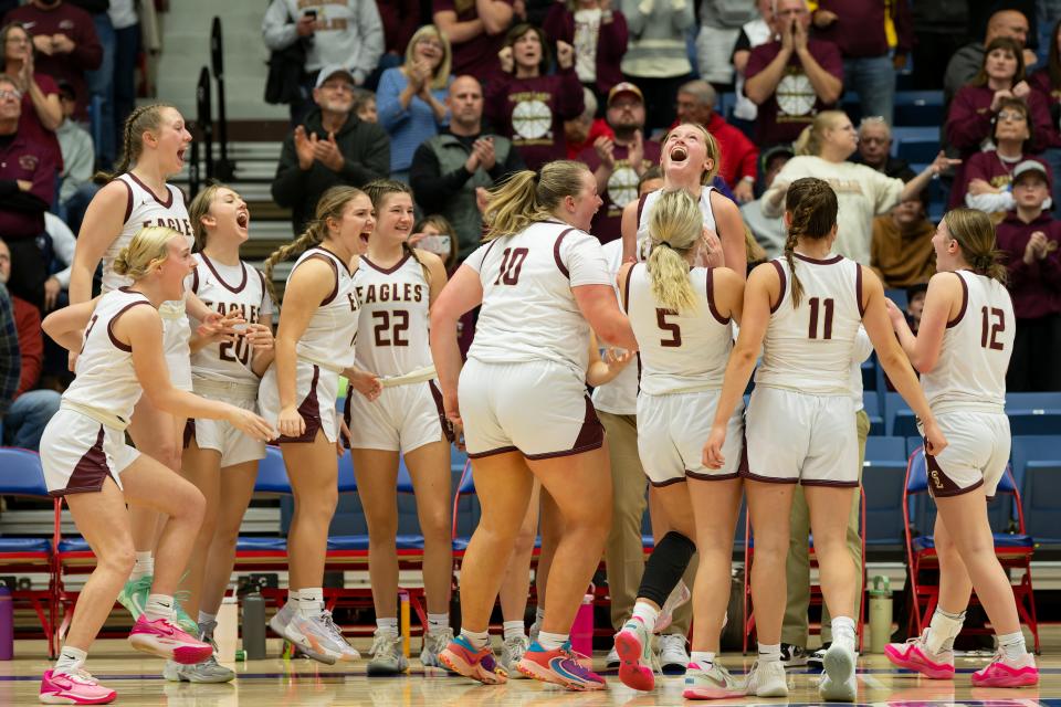 Silver Lake reacts after defeating Hayden during State Basketball March. 8, 2024 at Hutchinson Sports Arena.