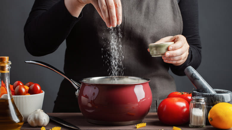 Cook seasoning food in a pot 