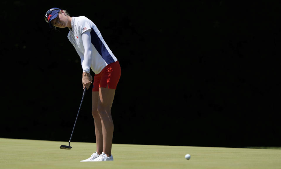 Nelly Korda, of the United States, makes a putt on the 18th hole during the first round of the women's golf event at the 2020 Summer Olympics, Wednesday, Aug. 4, 2021, at the Kasumigaseki Country Club in Kawagoe, Japan. (AP Photo/Andy Wong)