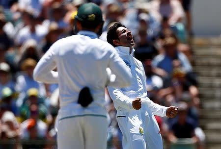 Cricket - Australia v South Africa - First Test cricket match - WACA Ground, Perth, Australia - 4/11/16 South Africa's Keshav Maharaj celebrates after dismissing Australia's captain Steve Smith LBW at the WACA Ground in Perth. REUTERS/David Gray