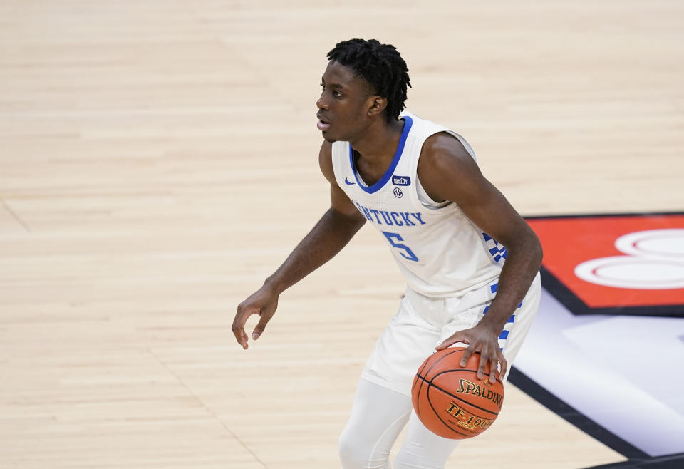 FILE - In this Dec. 1, 2020, file photo, Kentucky's Terrence Clarke brings the ball up during the second half of the team's NCAA college basketball game against Kansas in Indianapolis. Kentucky says freshman guard Clarke died following a car accident in Los Angeles. He was 19. The school announced Clarke’s death in a release Thursday night, April 22, 20221, but did not include any more details. (AP Photo/Darron Cummings, File)