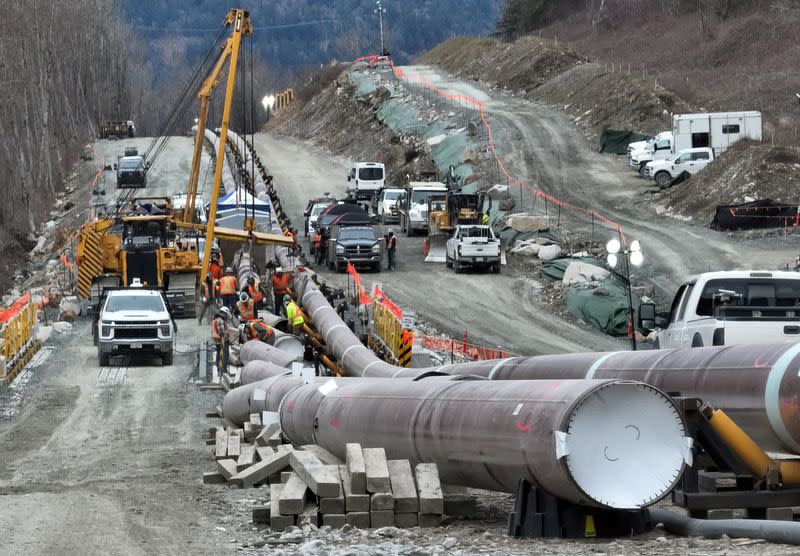 FILE PHOTO: The last section of pipeline is assembled on the Trans Mountain pipeline expansion project near Laidlaw