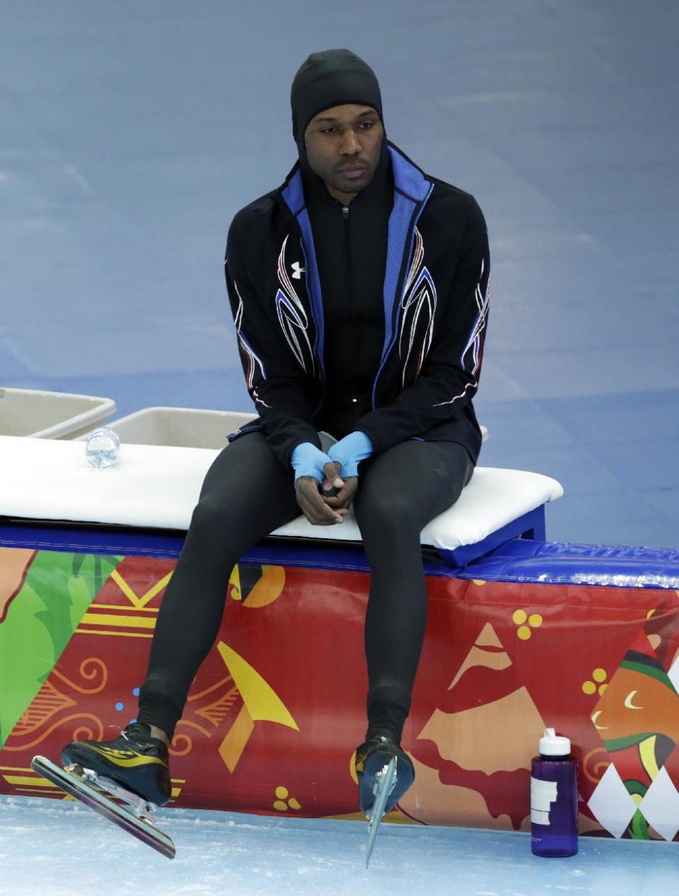 Shani Davis of the U.S. looks dejected after competing in the men's 1,500-meter speedskating race at the Adler Arena Skating Center during the 2014 Winter Olympics in in Sochi, Russia, Saturday, Feb. 15, 2014. (AP Photo/Matt Dunham)