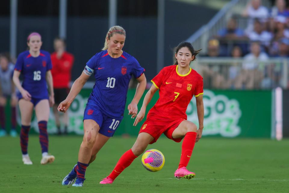 USWNT's Lindsey Horan (10), defended by China's Wang Yanwen (7), was one of the USA's scorers in Saturday's 3-0 win.