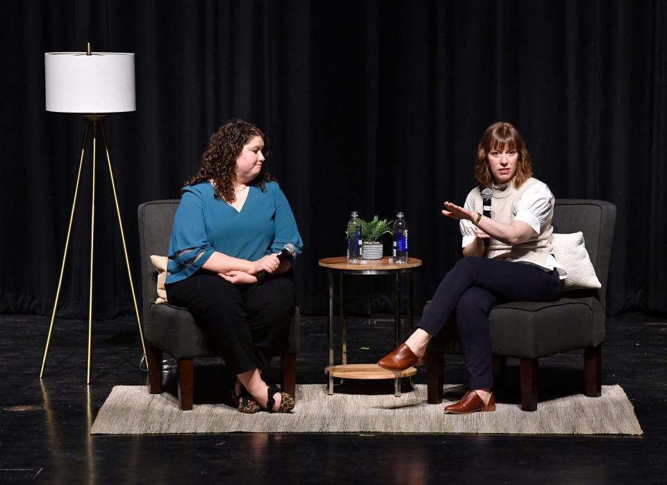 Beth Silvers (left) and Sarah Stewart Holland speak during an appearance at Boone Family Theatre on the Abilene Christian University campus Wednesday. The women are the hosts of the podcast “Pantsuit Politics.”