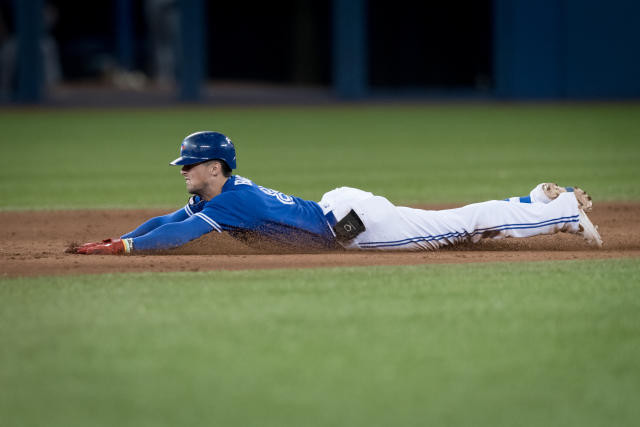 Cavan Biggio of the Toronto Blue Jays looks on from first base