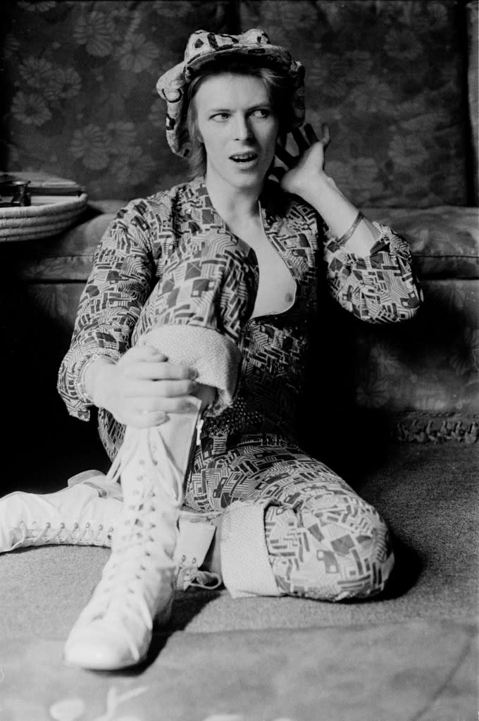David Bowie at home in Beckenham, Kent, 1972 - Credit: © Michael Putland