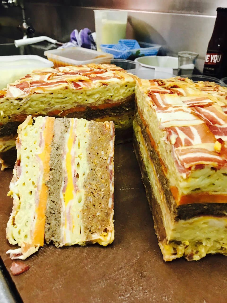 The cake is prepared in an industrial kitchen in 15 kilo slabs. Photo: Be