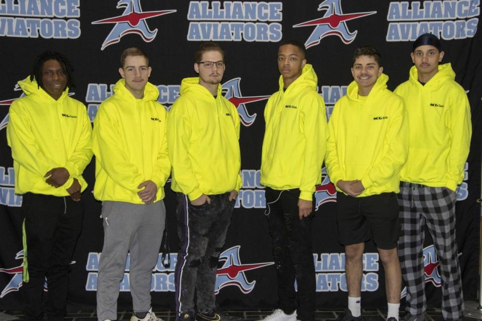 From left: Ke'sean Kilgore, Aiden Yacklin, James Metzger, Tyion Miles, Alex Hinojosa, Tra'Sean Williams, all seniors at Alliance High School. The six students were recently hired as part-time paid interns for SCG Fields LLC, a firm remodeling several athletic fields in the school district.