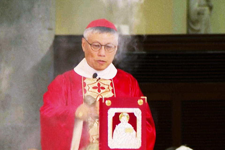 FILE - Hong Kong's Bishop and new Cardinal Stephen Chow presides over the service at Hong Kong's Cathedral of the Immaculate Conception in Hong Kong on Nov. 4, 2023. Joseph Li, the head of the Catholic church in China, began a trip to Hong Kong on Tuesday, Nov. 14, at the invitation of Chow, the city’s pope-appointed Roman Catholic cardinal, marking the first official visit by a Beijing bishop in history. (AP Photo, File)