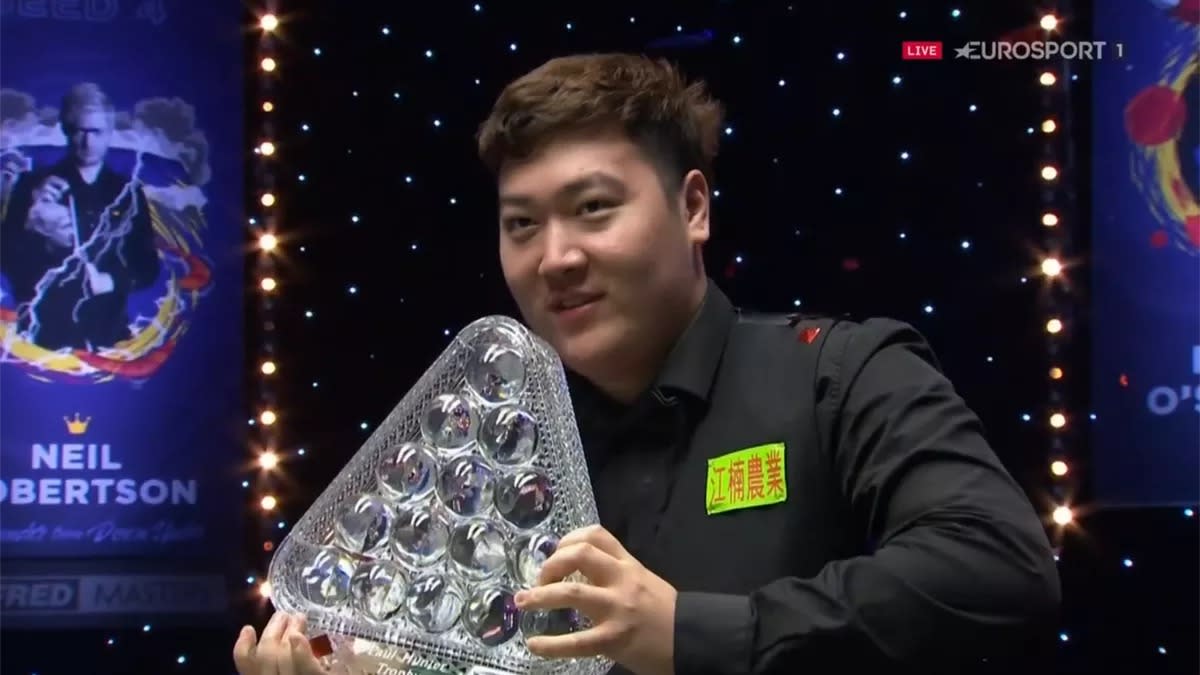 Asian sensation Yan became the youngest player to lift the Paul Hunter Trophy since Ronnie O'Sullivan in 1995