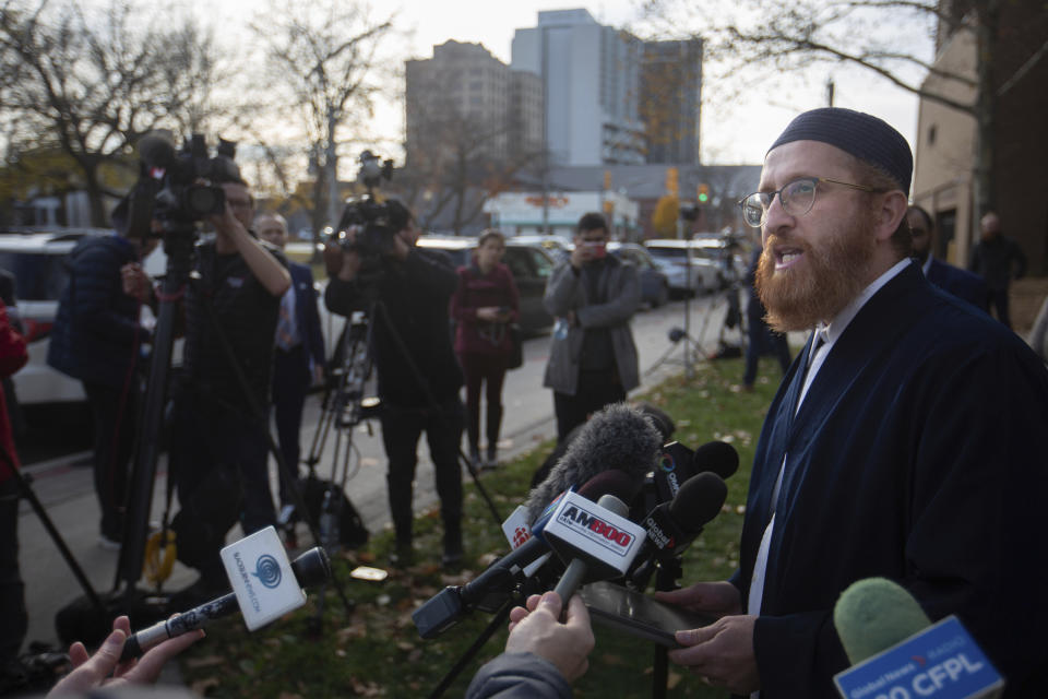 Imam Adbelfattah Tawakul speaks to the media outside the Superior Court of Justice after a verdict in the Nathaniel Veltman murder trial was reached, on Thursday, Nov. 16, 2023, in Windsor, Canada. Veltman was found guilty Thursday of four counts of first-degree murder for deliberately using his pickup to kill four members of a Muslim family two years ago. (Dax Melmer/The Canadian Press via AP)