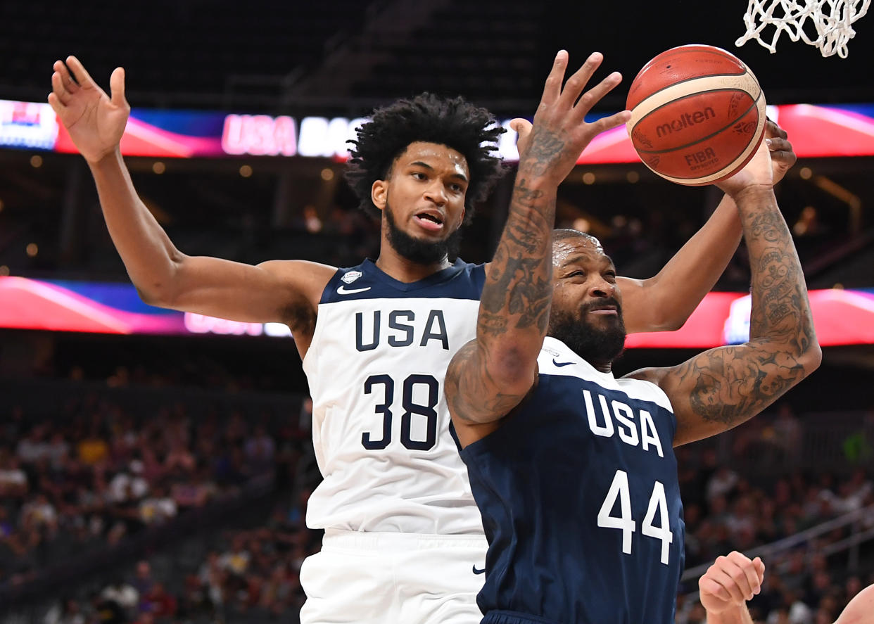 Aug 9, 2019; Las Vegas, NV, USA; USA Men's National Blue Team forward P.J. Tucker (44) grabs a rebound in front of USA Men's National White Team forward Marvin Bagley III (38) during the first half of the USA Basketball Men's National Team intra-squad game at T-Mobile Arena. Mandatory Credit: Stephen R. Sylvanie-USA TODAY Sports