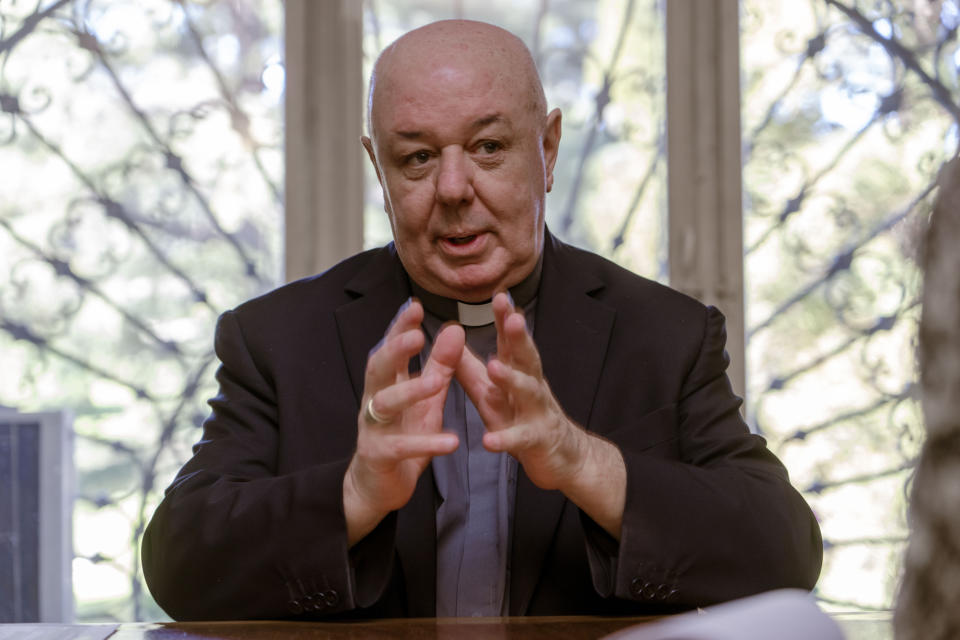 Prefect of the Archivio Apostolico Vaticano, Bishop Sergio Pagano speaks in his office at The Vatican, Wednesday, Feb. 14, 2024, during an interview with The Associated Press. In a new book-length interview with Italian journalist Massimo Franco, “Secretum”, Pagano divulges some of the unknown or behind-the-scenes details of well-known sagas of the Holy See and its relations with the outside world over the past 12 centuries. From Napoleon’s sacking of the archive in 1810 to the Galileo affair and the peculiar conclave of 1922 that was financed almost entirely by donations from U.S. Catholics. (AP Photo/Domenico Stinellis)