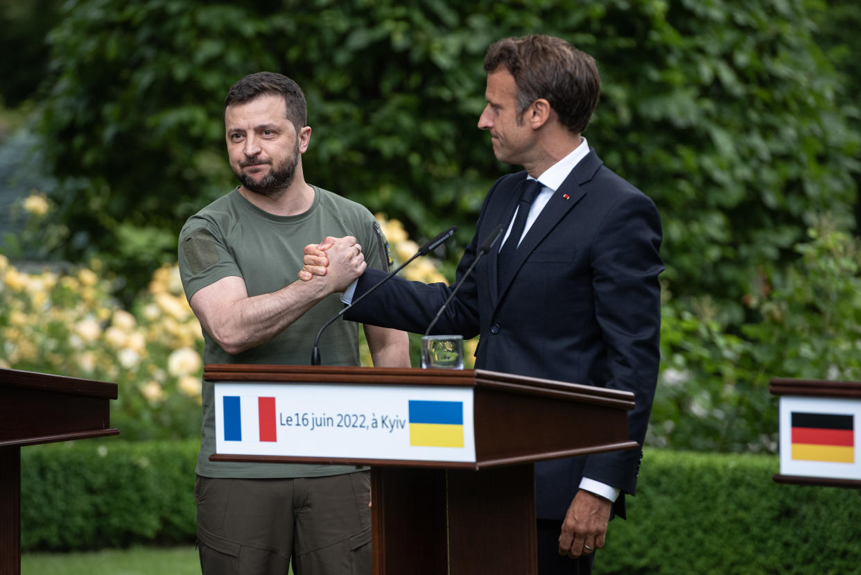 KYIV, UKRAINE - JUNE 16: Ukrainian President Volodymyr Zelensky and Frances President Emmanuel Macron shake hands after a press conference on June 16, 2022 in Kyiv, Ukraine. The leaders made their first visits to Ukraine since the country was invaded by Russia on February 24th. (Photo by Alexey Furman/Getty Images)