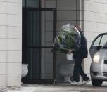 Flowers are brought to the funeral home prior to the visitation for Vito Rizzuto, head of the infamous Rizzuto crime family, in Montreal December 29, 2013. Rizzuto died of natural causes in a hospital on December 23, 2013. REUTERS/Christinne Muschi (CANADA - Tags: CRIME LAW OBITUARY SOCIETY)