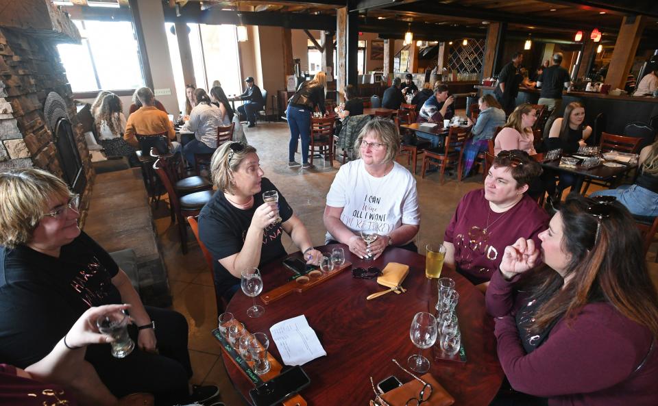 Enjoying wine tastings, on April 30, 2022, at Arundel Cellars & Brewing Co., 11727 E. Main St. in North East Township, are, from left: Kathy Constantino, 59; Heidi Bane, 43; Kerry Coan, 63; Bridgette Smith, 44 and Missy Brady, 40. The friends, all from Jamestown, New York, were celebrating Coan's recent retirement.