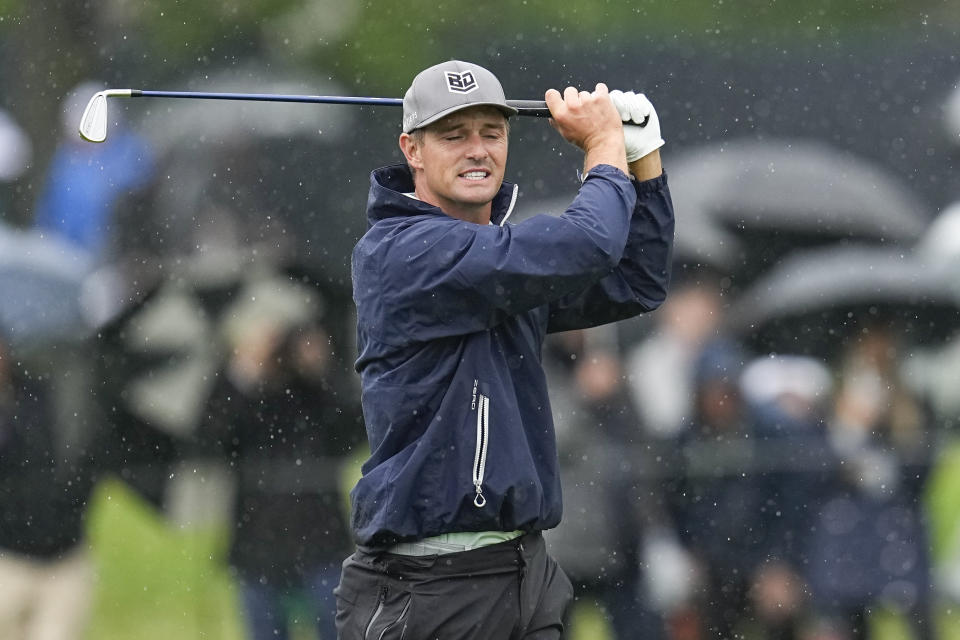Bryson DeChambeau hits from the fairway on the sixth hole during the third round of the PGA Championship golf tournament at Oak Hill Country Club on Saturday, May 20, 2023, in Pittsford, N.Y. (AP Photo/Abbie Parr)
