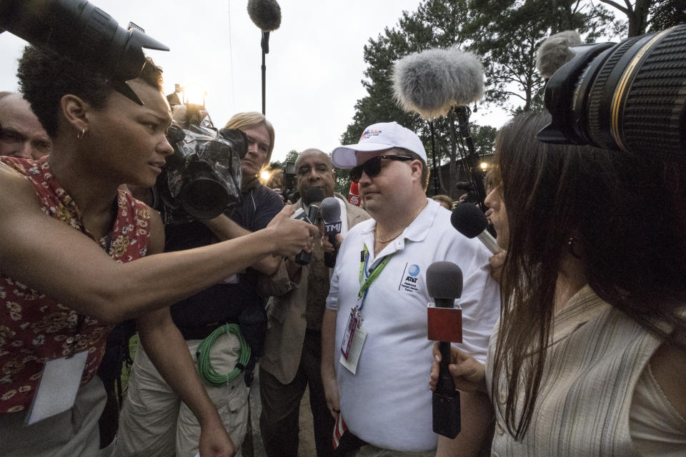 This image released by Warner Bros. Pictures shows Paul Walter Hauser, center, in a scene from "Richard Jewell." (Claire Folger/Warner Bros. Pictures via AP)