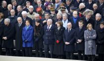 Members of the French government, French politicians, officials and guests attend a ceremony to pay a national homage to the victims of the Paris attacks at Les Invalides monument in Paris, France, November 27, 2015. L to R, first row : French National Assembly speaker Claude Bartolone, French Foreign Minister Laurent Fabius, Environment Minister Segolene Royal, Education Minister Najat Vallaud-Belkacem, Finance Minister Michel Sapin, Health Minister Marisol Touraine, Interior Minister Bernard Cazeneuve, Economy Minister Emmanuel Macron, State Reform Minister Marylise Lebranchu and Sports Minister Patrick Kanner. (REUTERS/Jacky Naegelen)