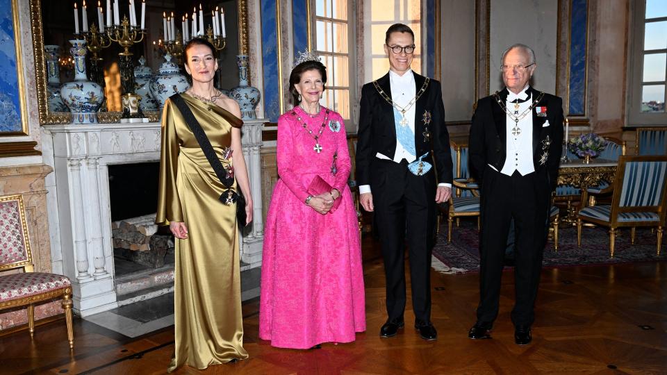 Finland's first lady Suzanne Innes-Stubb, Queen Silvia Finland's President Alexander Stubb and Sweden's King Carl Gustaf pose for a photo at the royal couple's gala dinner for the Finnish presidential couple at the Stockholm Palac