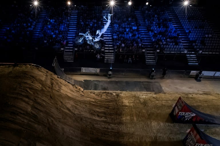 Australian rider Pat Bowden performs during a motocross freestyle show in Tours