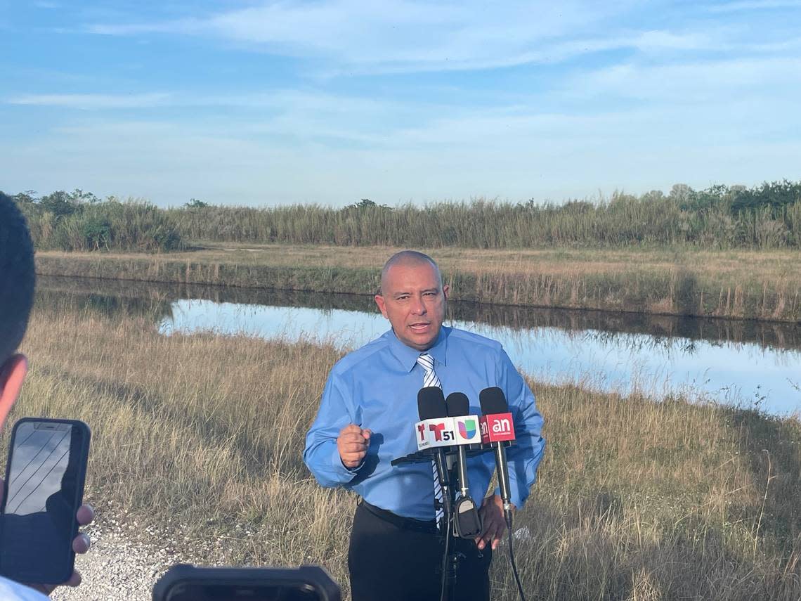 Det. Alvaro Zabaleta, a spokesman of the Miami-Dade Police Department, speaks to reporters after a helicopter crashed in a southwest Miami-Dade County canal on Wednesday, Dec. 27, 2023.