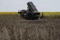 A Ukrainian rocket launcher is seen near the eastern Ukrainian city of Seversk July 12, 2014. REUTERS/Gleb Garanich