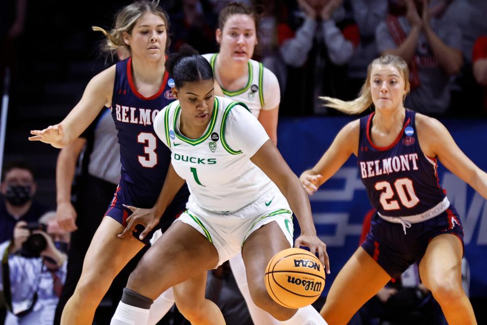 Oregon forward Nyara Sabally (1) works to shoot against Belmont forward Madison Bartley (3) during the first half of a college basketball game in the first round of the NCAA Tournament on March 19 in Knoxville, Tenn.