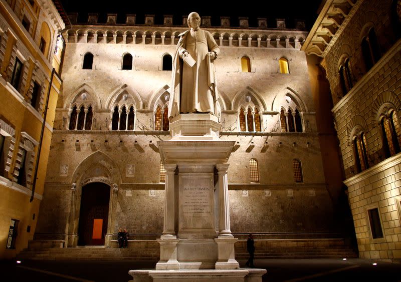 FILE PHOTO: The entrance of Monte dei Paschi bank headquarters is seen in downtown Siena