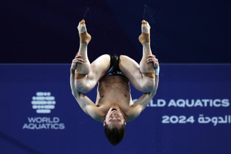 Wang Zongyuan of China competes during the men's 3m springboard diving final at the World Aquatics Championships in Doha, Qatar, Wednesday, Feb. 7, 2024. (AP Photo/Hassan Ammar)