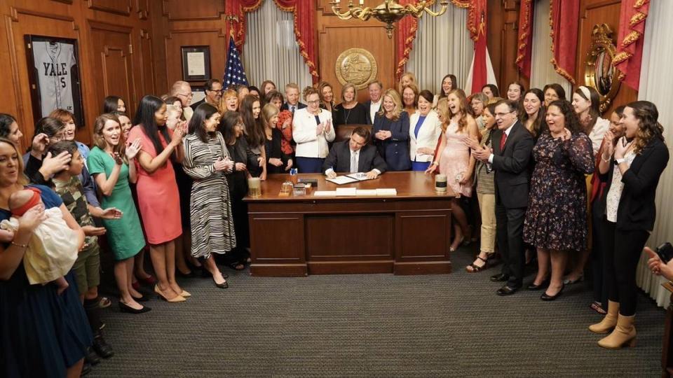 Gov. Ron DeSantis signed the Heartbeat Protection Act, which bans most abortion after six weeks of pregnancy, in his office on April 13, 2023, in a late-night session.