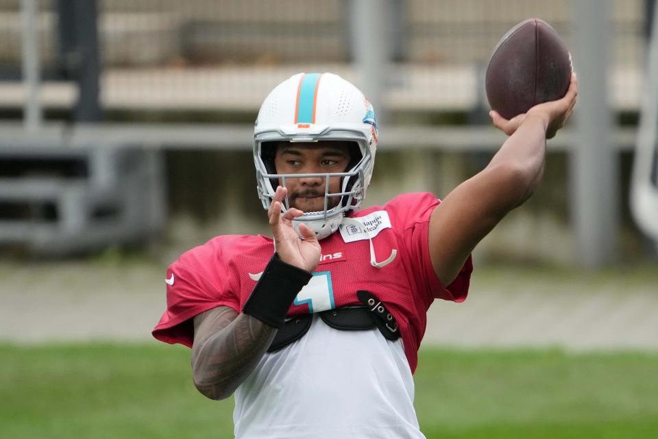 Dolphins quarterback Tua Tagovailoa throws the ball during Miami's practice at the PSD Bank Arena in Frankfurt, Germany on Nov. 2, 2023.