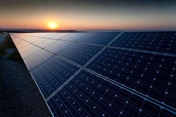 Large solar array at sunset.