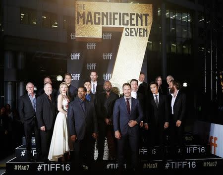 The cast poses on the red carpet for the film "The Magnificent Seven" during the 41st Toronto International Film Festival (TIFF), in Toronto, Canada, September 8, 2016. REUTERS/Mark Blinch