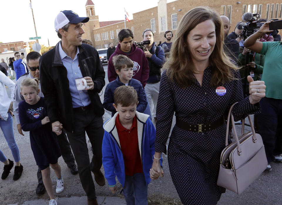 FILE - In this Nov. 6, 2018, file photo, then-Rep. Beto O'Rourke, the 2018 Democratic Candidate for Senate in Texas, wearing cap, leaves a polling place with his family after voting in El Paso, Texas. (AP Photo/Eric Gay, File)