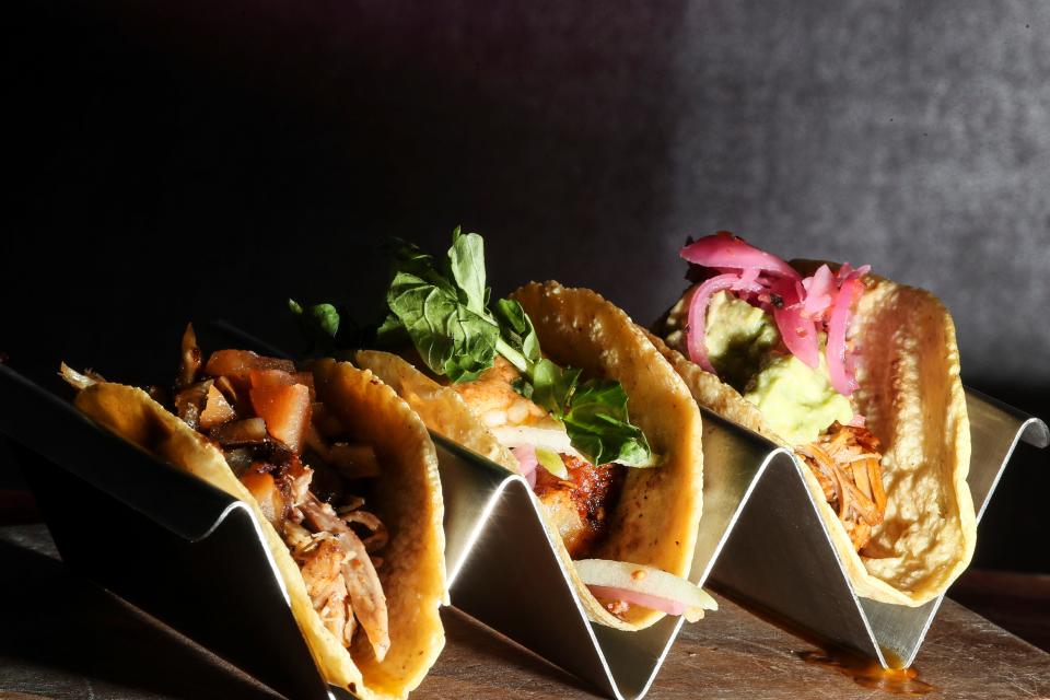Taco offerings from La Dama Mexican Kitchen include Duck Carnitas, from left, Pancita, and Cochinita Pibil.
