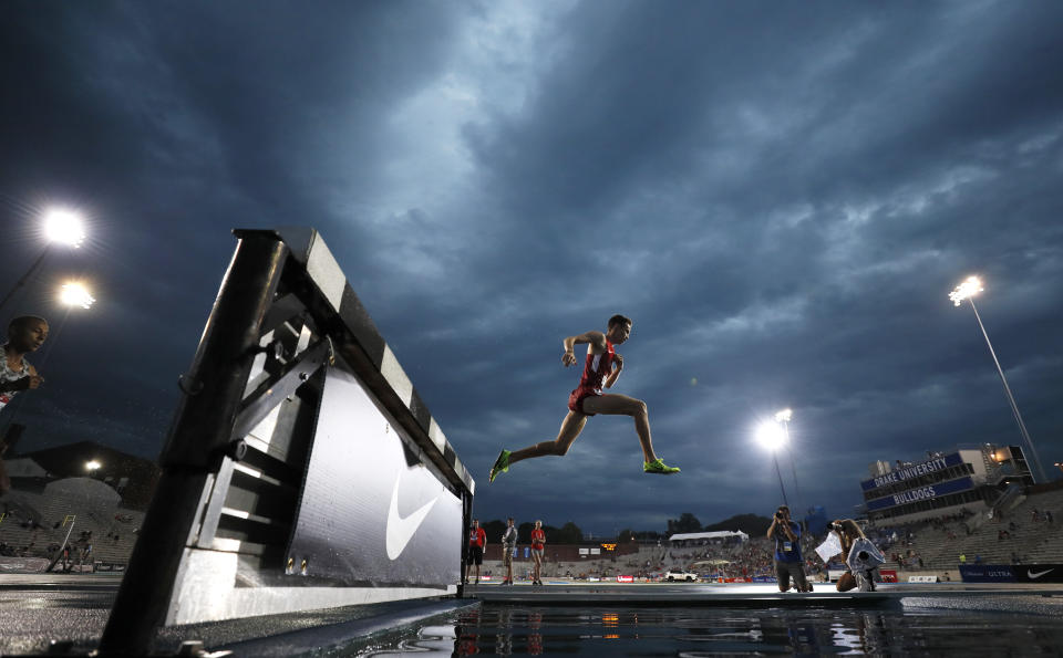 Bailey Roth leaps over the water pit during a preliminary heat in the men's 3,000-meter steeplechase at the U.S. Championships athletics meet, Thursday, July 25, 2019, in Des Moines, Iowa. (AP Photo/Charlie Neibergall)
