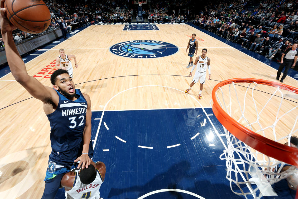 Karl-Anthony Towns put Paul Millsap on a poster Wednesday, something the Timberwolves need more of from their big man. (Getty)