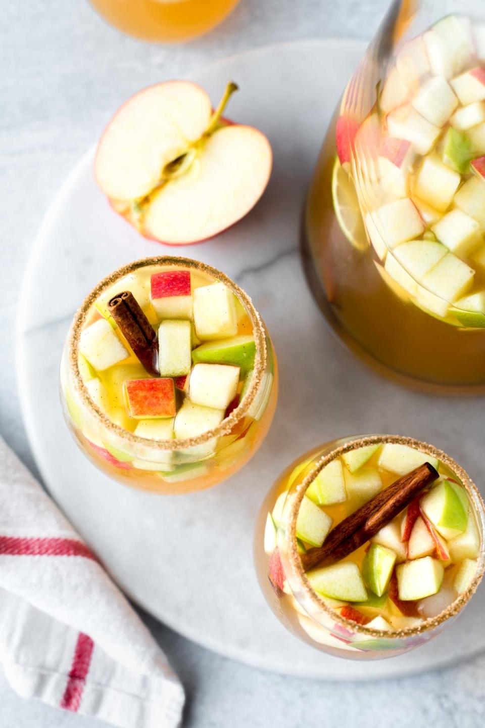 Glasses of apple cinnamon sangria.