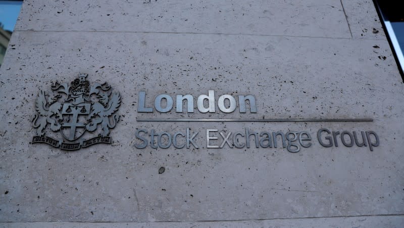 FILE PHOTO: Signage is seen outside the entrance of the London Stock Exchange in London