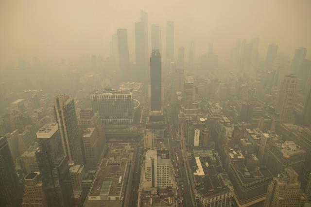 Canadian wildfire smoke surrounds Yankee Stadium as New York issues health  advisory over poor air quality