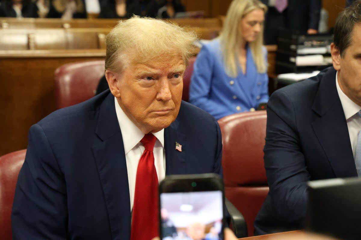 Donald Trump appears in a Manhattan criminal courtroom on 25 April (EPA)