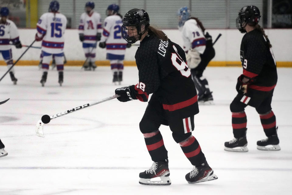 Bishop Kearney Selects Under-19 girls team winger Nela Lopusanova (88) warms up before a hockey game in a Labor Day Weekend tournament in Pittsburgh, Friday, Sept. 1, 2023. (AP Photo/Gene J. Puskar)
