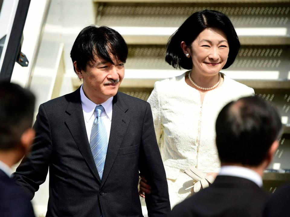 Japan's Crown Prince Akishino, left and Crown Princess Kiko arrive at Helsinki-Vantaa airport in Vantaa, Finland, Tuesday, July 2, 2019, at the start of a four-day visit. (Vesa Moilanen/Lehtikuva via AP)