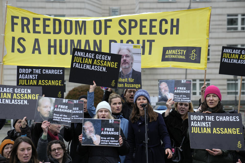 Demonstrators hold banners during a rally in support of Julian Assange in front of the U.S embassy in Berlin, Tuesday, Feb. 20, 2024. Assange's lawyers will begin their final U.K. legal challenge on Tuesday to stop the WikiLeaks founder from being sent to the United States to face spying charges. (AP Photo/Ebrahim Noroozi)