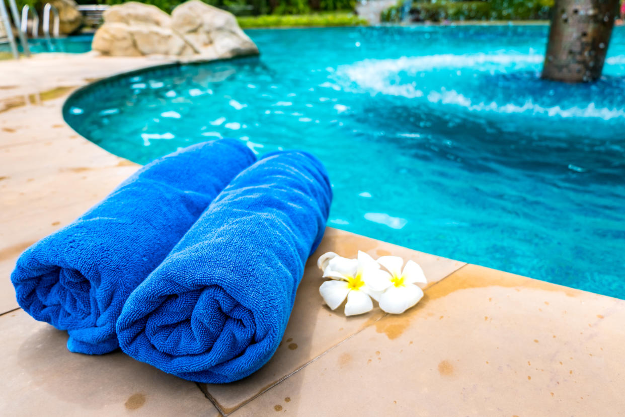 The towel is placed by the Swimming Pool