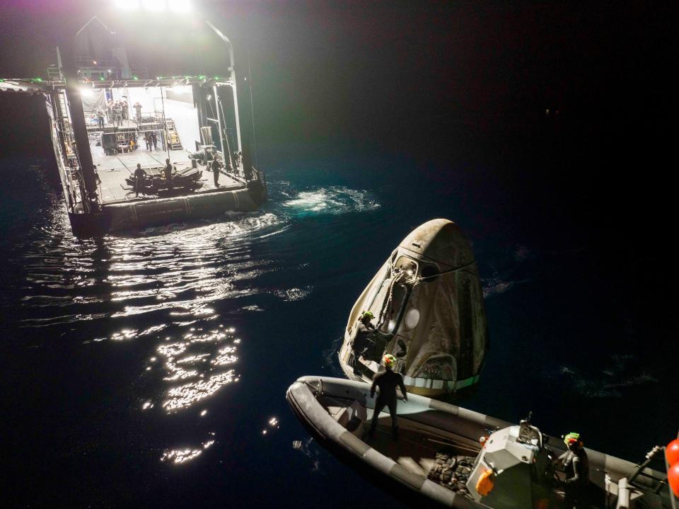 The SpaceX recovery vessel illuminates the waters of the Gulf of Mexico as teams work to rig up the Crew Dragon Freedom capsule shortly after its successful splashdown at 11:04 p.m. EDT, May 30, wrapping up the Axiom-2 private astronaut mission to the International Space Station.