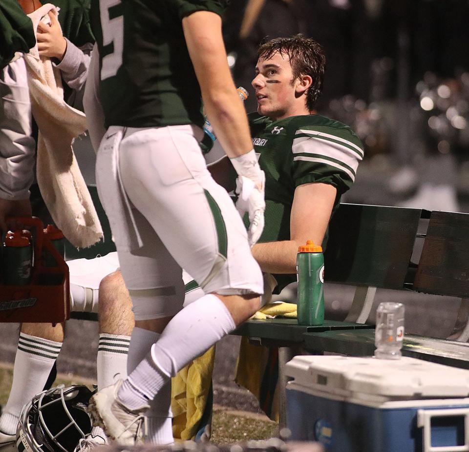 Dragons QB Matt Festa gets a break after scoring three TD's in the third quarter.Duxbury hosted Danvers football in MIAA playoff action on Friday November 12, 2021 