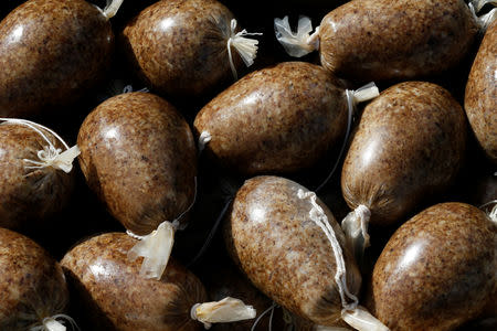 FILE PHOTO: Haggis to be used at the world haggis eating competition sit in a pile before the event at the Birnam Highland Games in Scotland August 30, 2014. REUTERS/Russell Cheyne/File Photo